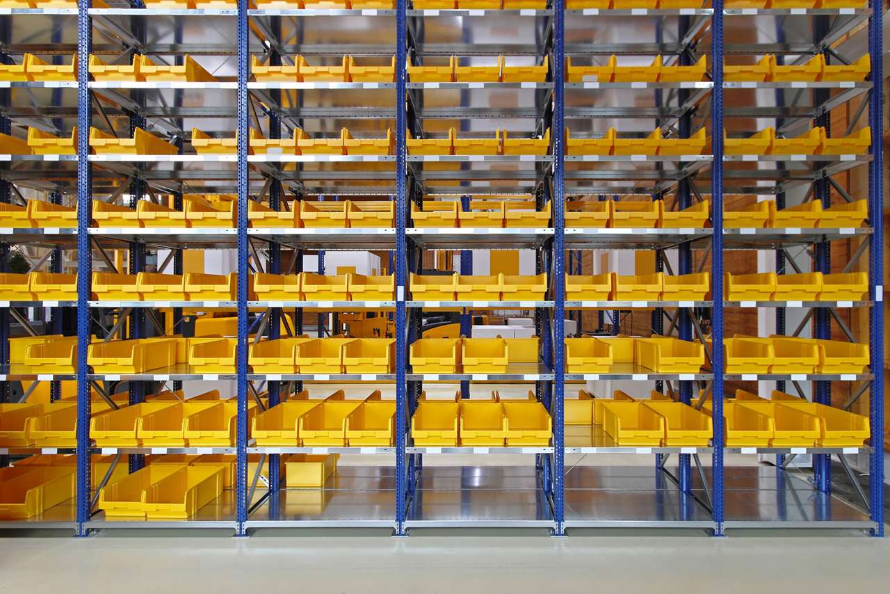 bins on a shelf in a general manufacturing facility