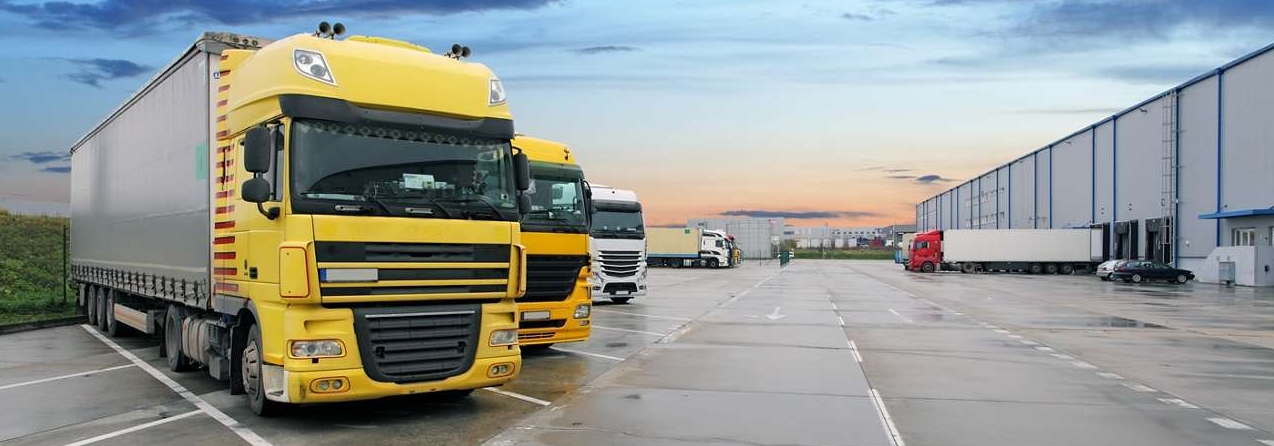 Cargo truck at warehouse building Cargo truck at warehouse building