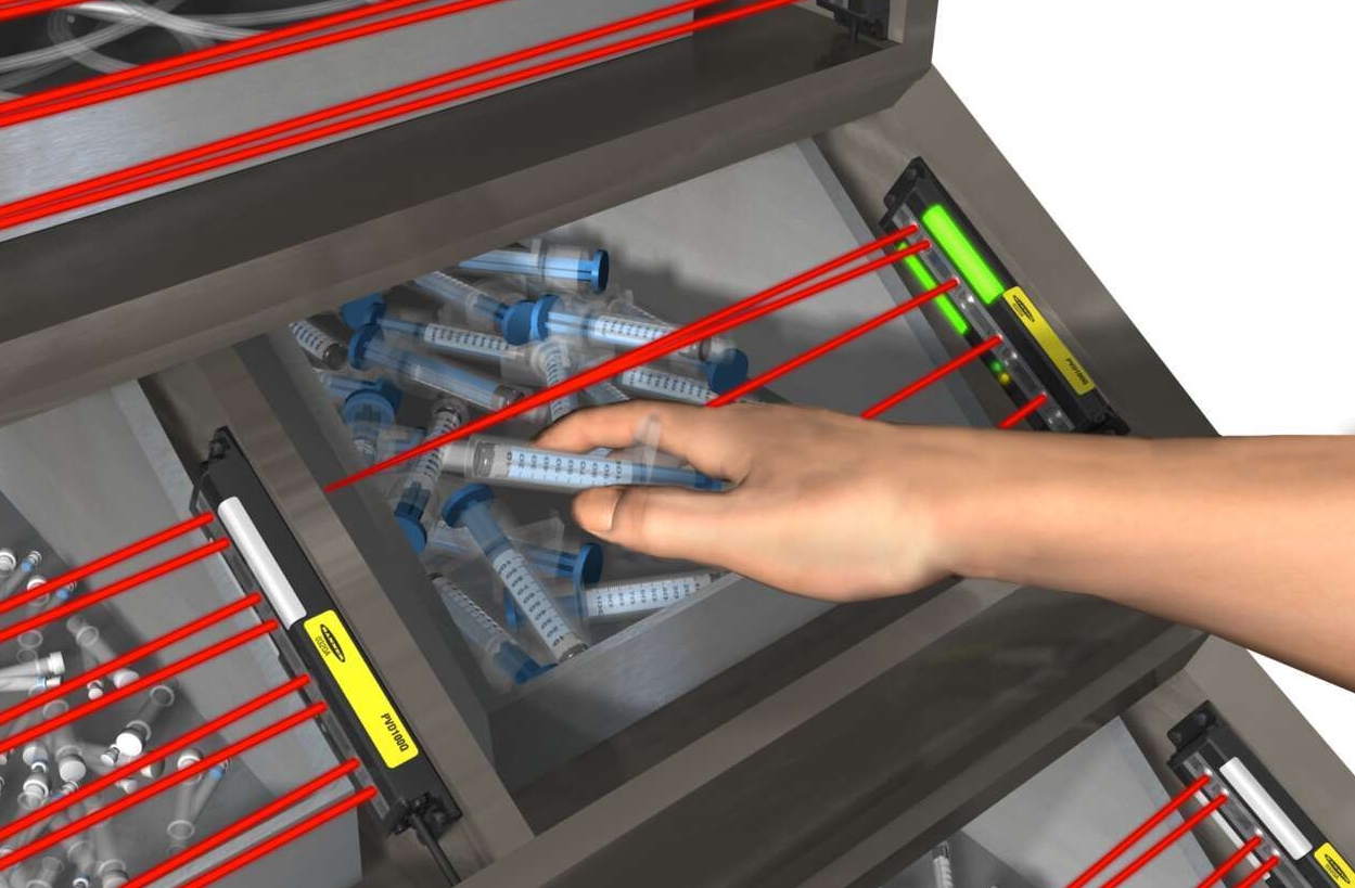 PVD-Surgical-Kit-Assembly assembler picks syringes to put in a medical kit